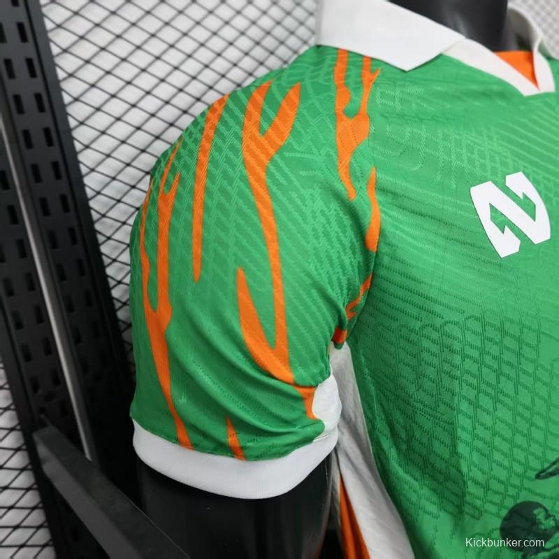 Player Version 2025 Ivory Coast Green with Elephant Graphic and Orange Trim Jersey